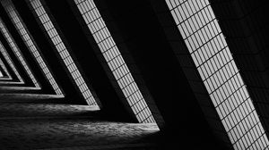 Preview wallpaper building, architecture, windows, light, black and white, dark