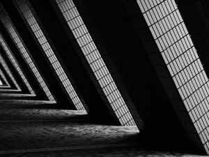 Preview wallpaper building, architecture, windows, light, black and white, dark