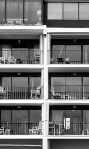 Preview wallpaper building, balconies, chairs, black and white