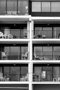 Preview wallpaper building, balconies, chairs, black and white