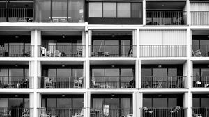 Preview wallpaper building, balconies, chairs, black and white