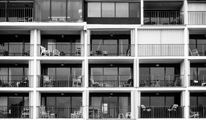 Preview wallpaper building, balconies, chairs, black and white