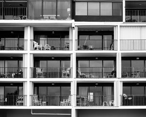 Preview wallpaper building, balconies, chairs, black and white