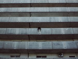 Preview wallpaper building, balconies, man, architecture, high-rise