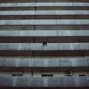 Preview wallpaper building, balconies, man, architecture, high-rise