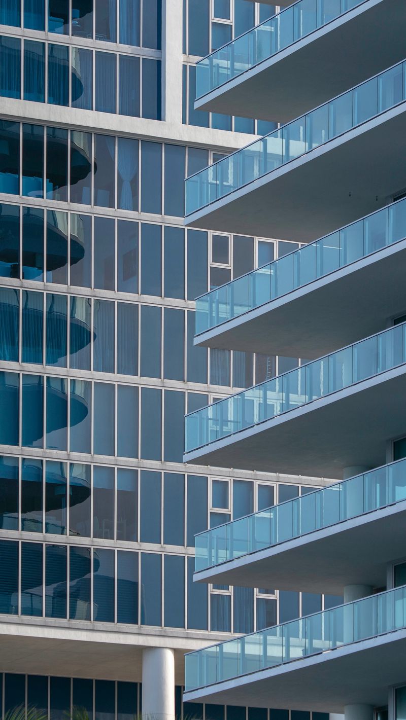 800x1420 Wallpaper building, balcony, glass, facade, architecture