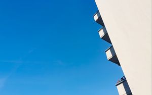 Preview wallpaper building, balcony, sky, blue