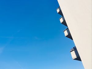 Preview wallpaper building, balcony, sky, blue