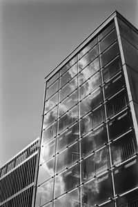 Preview wallpaper building, bars, glass, clouds, reflection, bw