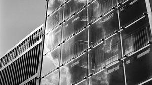 Preview wallpaper building, bars, glass, clouds, reflection, bw