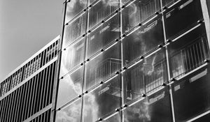 Preview wallpaper building, bars, glass, clouds, reflection, bw
