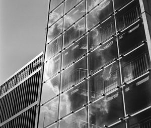 Preview wallpaper building, bars, glass, clouds, reflection, bw