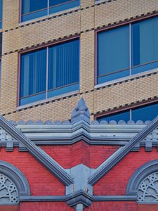 Preview wallpaper building, bas-relief, bricks, architecture