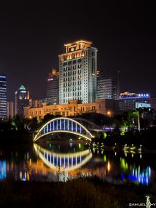 Preview wallpaper building, bridge, lights, water, reflection, city, night
