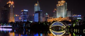 Preview wallpaper building, bridge, lights, water, reflection, city, night