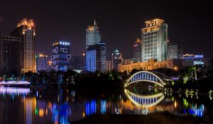 Preview wallpaper building, bridge, lights, water, reflection, city, night