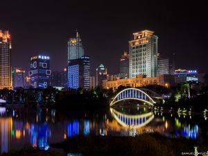 Preview wallpaper building, bridge, lights, water, reflection, city, night