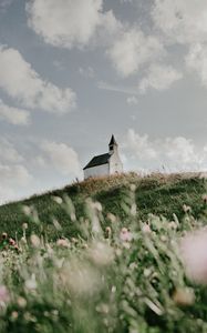 Preview wallpaper building, church, hill, flowers, grass