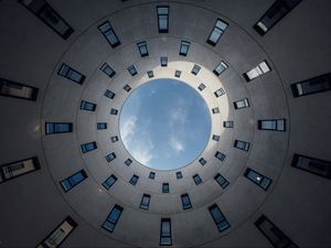 Preview wallpaper building, circle, bottom view, windows, sky