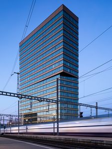 Preview wallpaper building, city, railway, modern