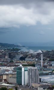 Preview wallpaper building, city, roofs, sea, coast, mountains