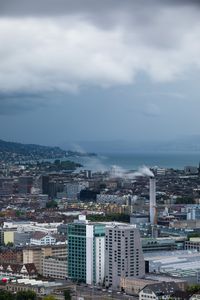 Preview wallpaper building, city, roofs, sea, coast, mountains