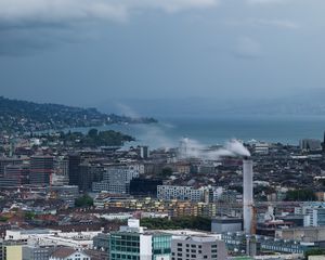 Preview wallpaper building, city, roofs, sea, coast, mountains