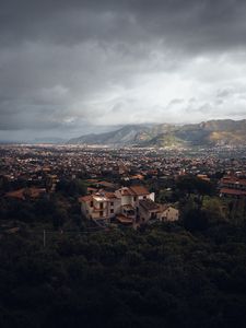 Preview wallpaper building, city, trees, mountains, distance