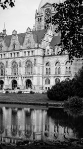 Preview wallpaper building, clock, tower, architecture, river, black and white