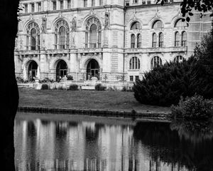 Preview wallpaper building, clock, tower, architecture, river, black and white