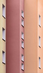 Preview wallpaper building, colorful, architecture, windows, walls, symmetry