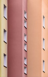 Preview wallpaper building, colorful, architecture, windows, walls, symmetry