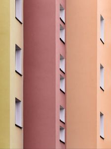 Preview wallpaper building, colorful, architecture, windows, walls, symmetry