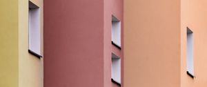 Preview wallpaper building, colorful, architecture, windows, walls, symmetry