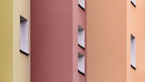 Preview wallpaper building, colorful, architecture, windows, walls, symmetry