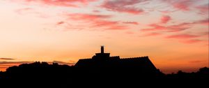 Preview wallpaper building, dark, shape, dusk, sunset