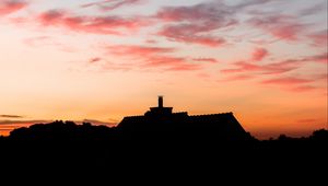 Preview wallpaper building, dark, shape, dusk, sunset
