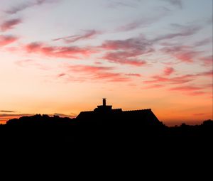 Preview wallpaper building, dark, shape, dusk, sunset