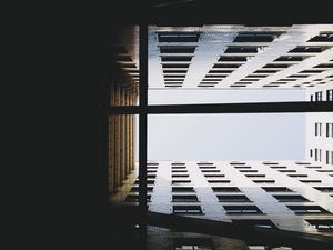 Preview wallpaper building, dark, sky, bottom view