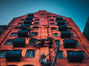 Preview wallpaper building, facade, architecture, brick, windows, balconies