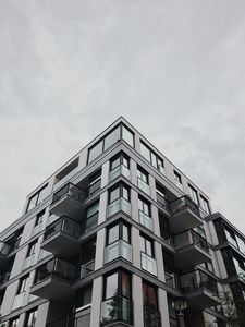 Preview wallpaper building, facade, architecture, corner, windows, balconies