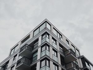 Preview wallpaper building, facade, architecture, corner, windows, balconies