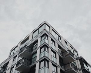 Preview wallpaper building, facade, architecture, corner, windows, balconies