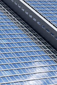 Preview wallpaper building, facade, architecture, windows, glass, reflection, clouds