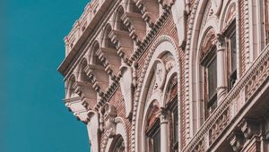 Preview wallpaper building, facade, architecture, relief, windows