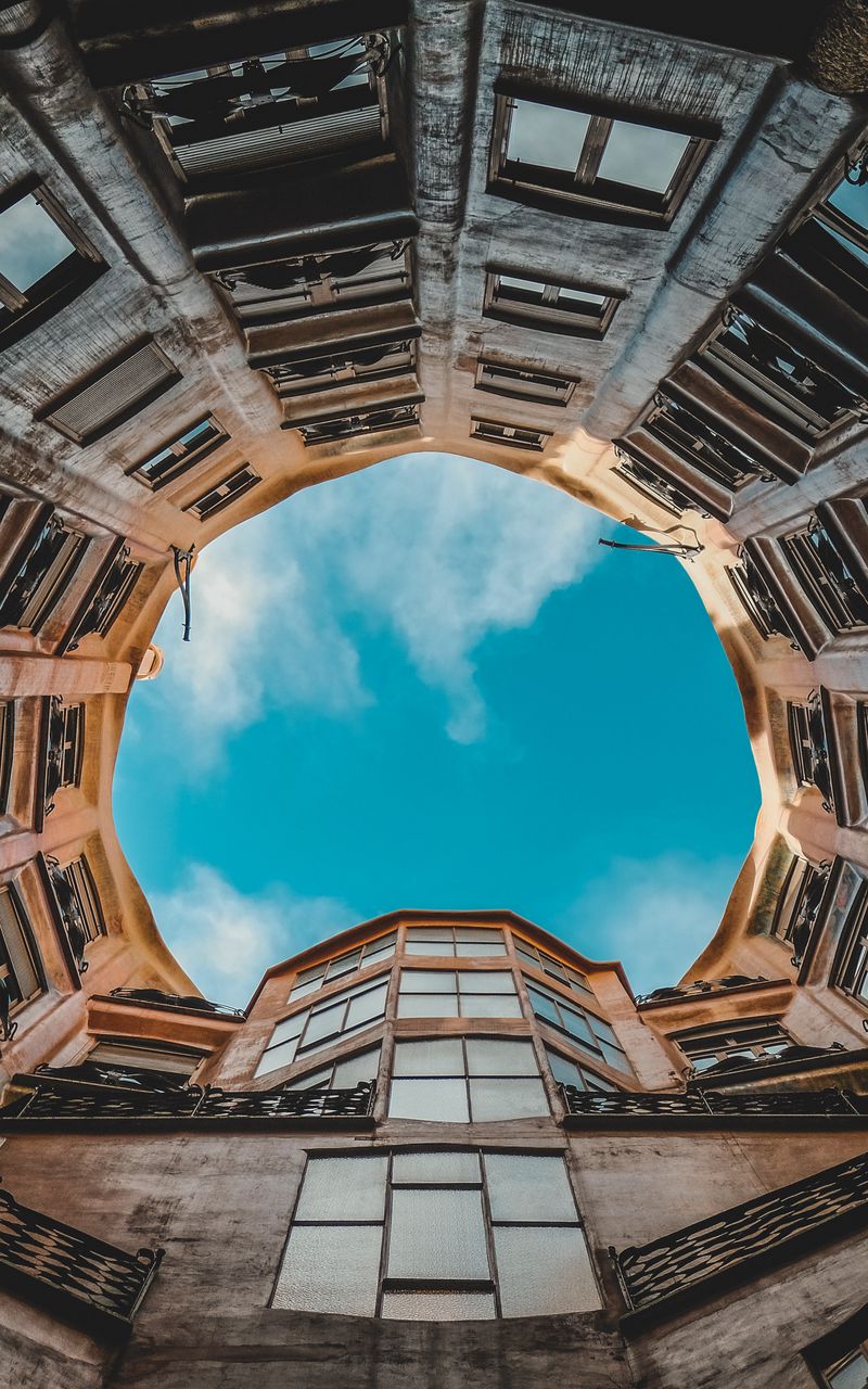 800x1280 Wallpaper building, facade, bottom view, sky, barcelona, spain