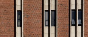 Preview wallpaper building, facade, bricks, windows, stripes