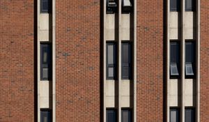 Preview wallpaper building, facade, bricks, windows, stripes