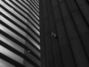 Preview wallpaper building, facade, bw, strip, camera