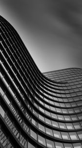 Preview wallpaper building, facade, curve, black and white, architecture